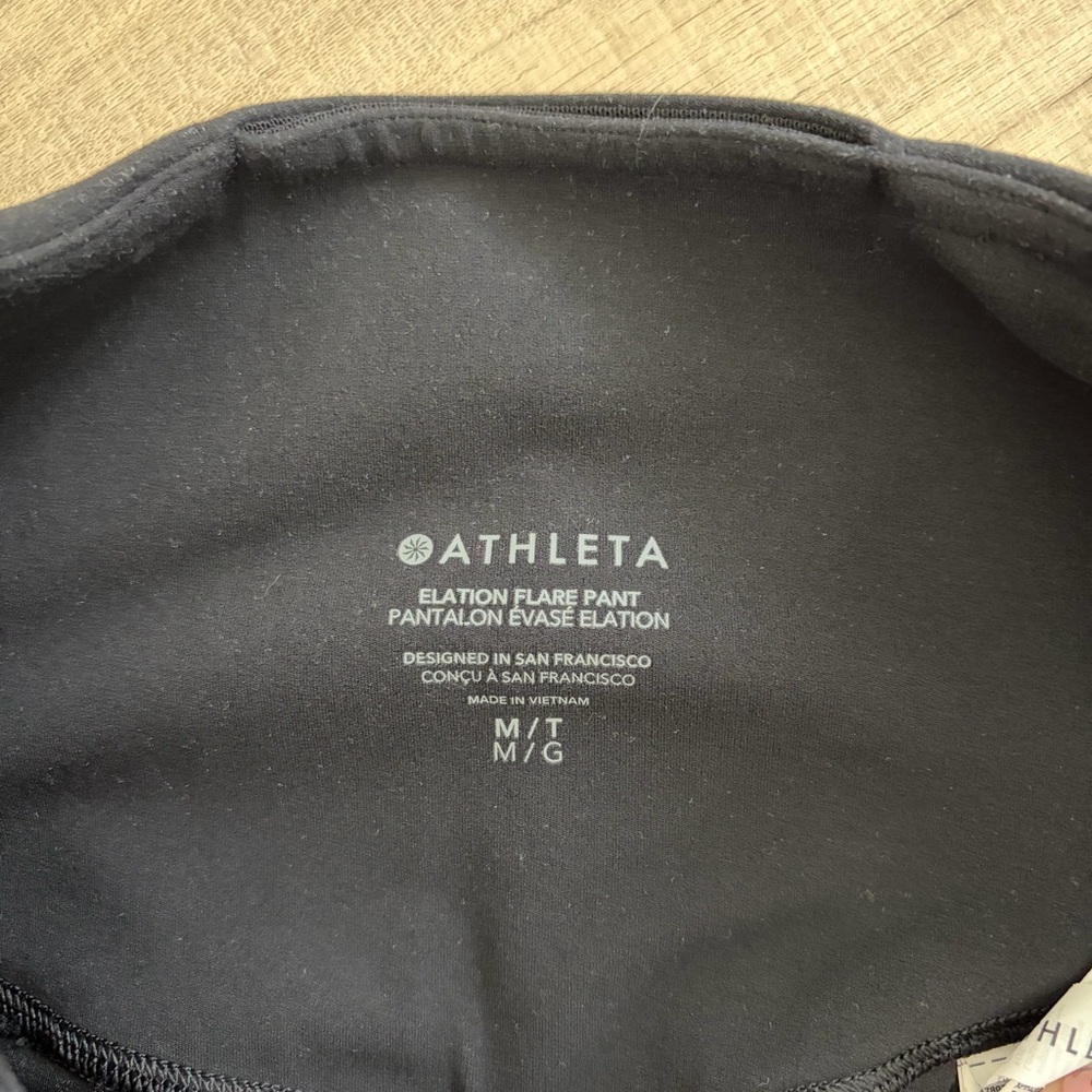 Athleta Ultra High Rise Elation Flare Leggings Black 34.5in Medium TALL - Picture 6 of 12